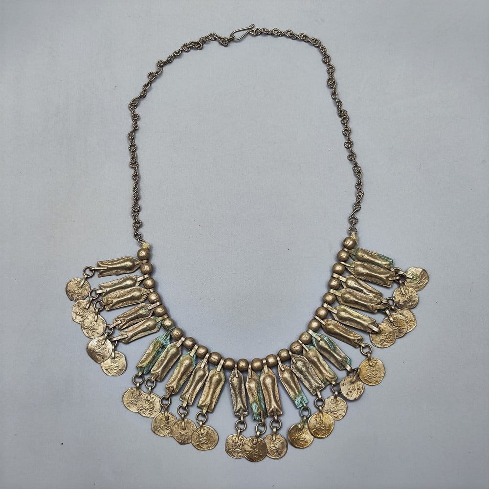 Antique Persian (low) silver link chain: Antique Persian (low) silver link chain, decorated in the central part with elongated links with coin-like appliqués with the portrait of Naser al-Din Shah Qajar (1831-1896), acid tested: light react