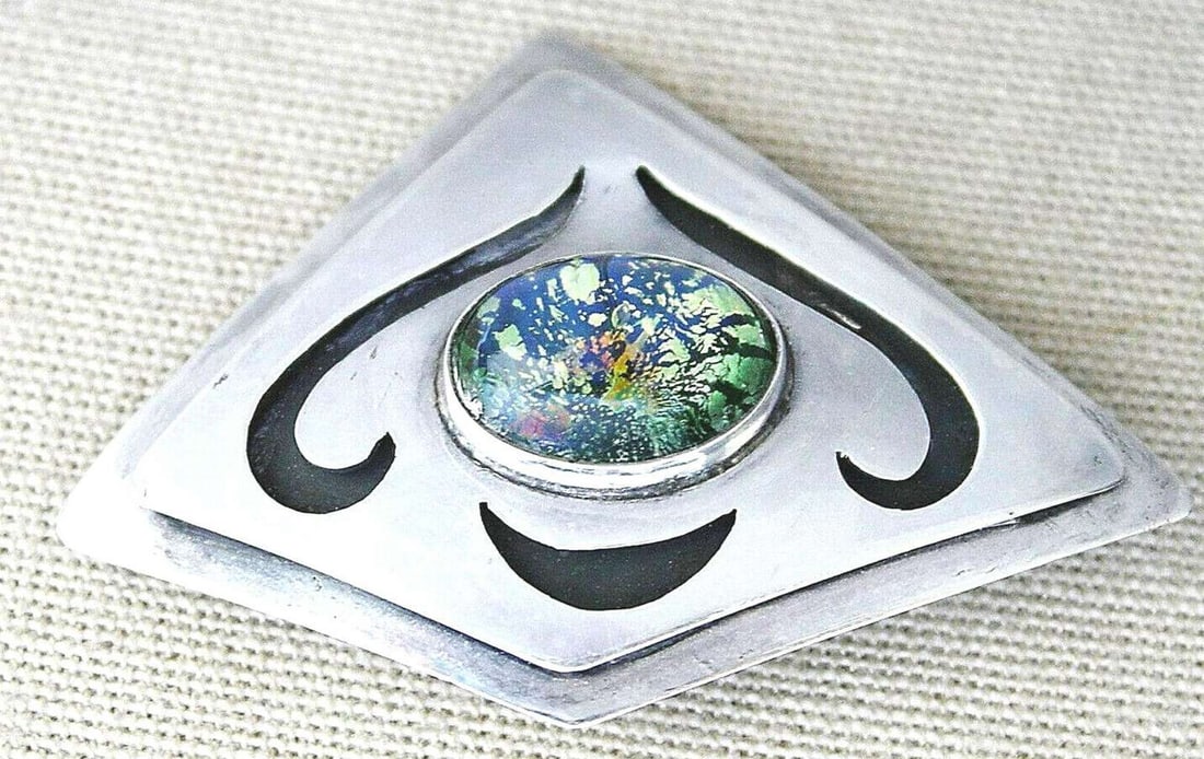 Vintage modernist silver sterling 925 pierced Pendant /Brooch set with art glass. Hazorfim, Israel,: Vintage modernist silver sterling 925 pierced Pendant /Brooch set with art glass. Hazorfim, Israel, 1970’s Maker’s mark of Hazorfim on lock Hand crafted, hammered, pierced. Size: 4 x 5.7 cm. (1.5