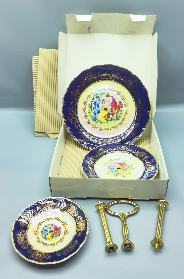 Luxury porcelain plate stand for serving cakes and cookies for tea time made of glass made by Moritz: A luxury porcelain plate stand for serving cakes and cookies for teatime in glass made by Moritz Zdekauer (MZ), Czech Republic, circa late 20th century, consists of three tiers of porcelain plates in