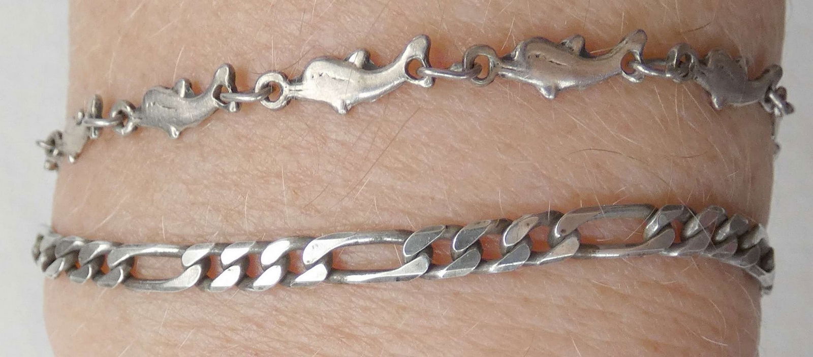 2 Vintage silver sterling 925 chain / link bracelets.: 2 Vintage silver sterling 925 chain / link bracelets. Italy chain bracelet, 19 cm. (7.5 inches) Dolphin links bracelet, 17 cm. (6.7 inches)
