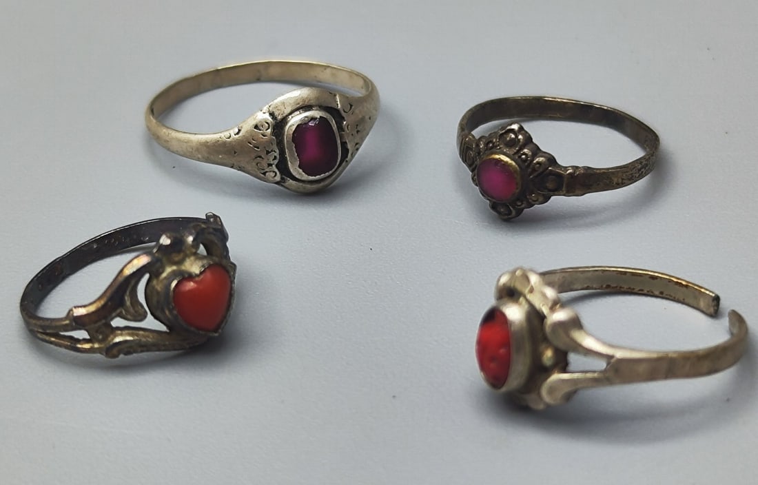 A set of 4 small antique European silver rings for girls (1 of 2)