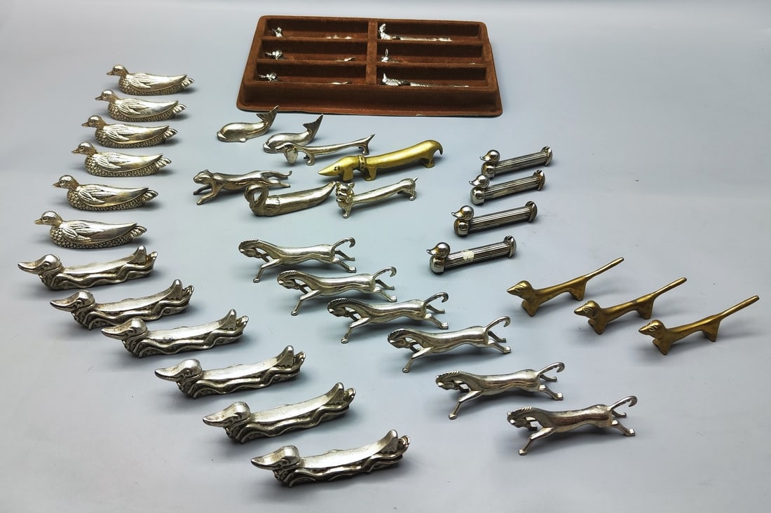 A large assortment of "animal" cutlery holders (1 of 10)