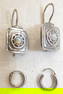 2 Pairs of vintage silver sterling earrings.
