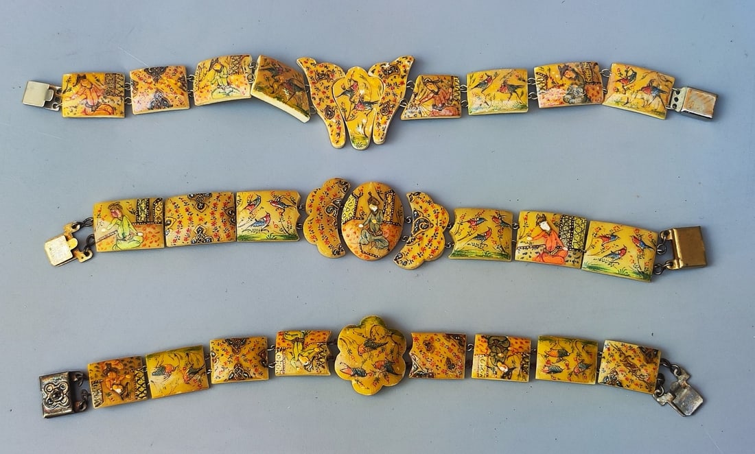 An assortment of 3 old Persian bone link bracelets: An assortment of 3 old Persian bone link bracelets, circa the middle of the 20th century, consisting of rectangular links and various designed links in the center, decorated with hand-painted figures,