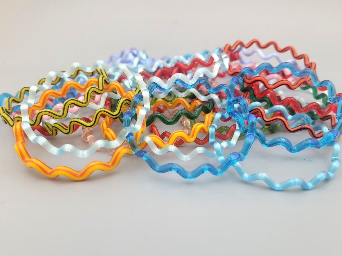 An assortment of 42 Art Deco "curly" glass bracelets (1 of 6)