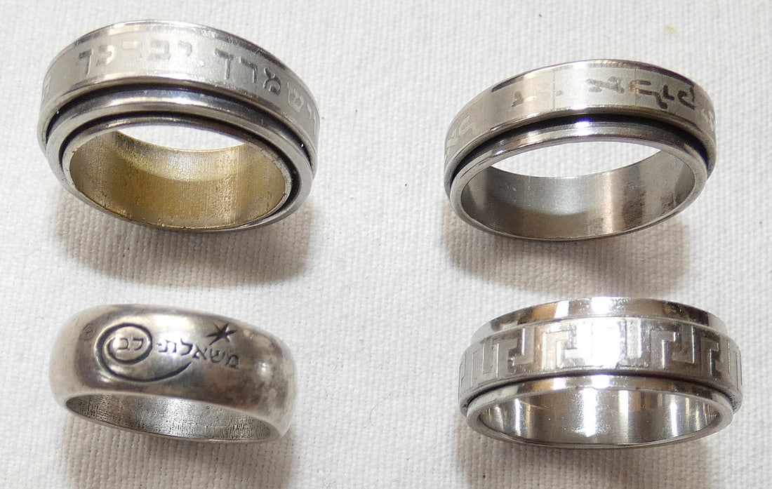 Lot of 4 stainless steel kabbalistic rotating spinning rings (1 of 10)