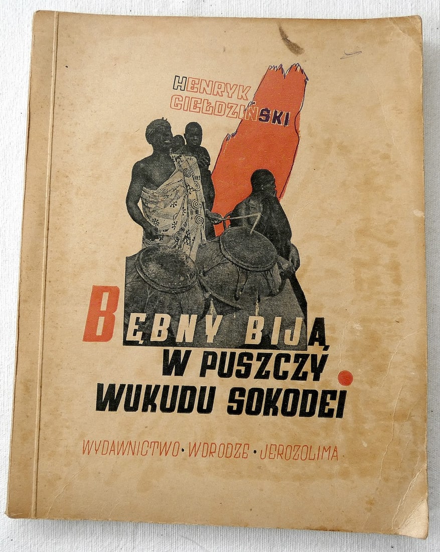 Henryk Gieldzinski. "Bebny Bija: W Puszczy Wukudu Sokodei", illust. 1st Polish ed., 1944,: Henryk Gieldzinski. Bebny Bija: W Puszczy Wukudu Sokodei illust. 1st Polish ed., 1944, Lithographed Avant–Garde photomontage soft cover The Drums Beat: In the Wilderness of the Kudu Sokodei Lithogra
