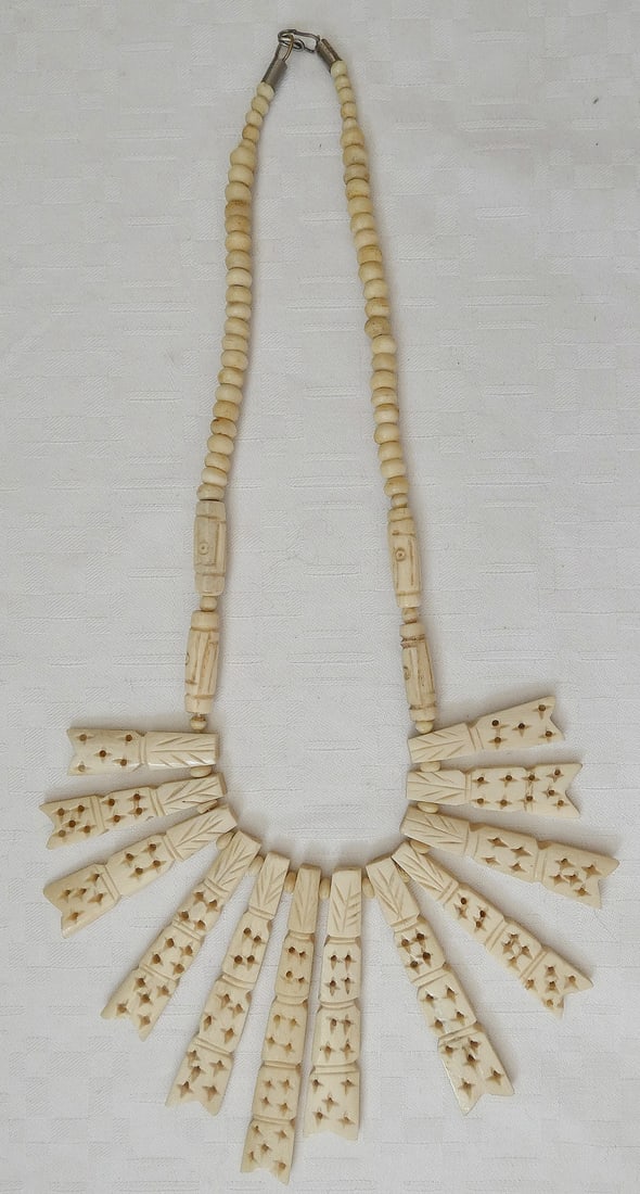 Art Deco Yellow Carved Material Necklace, Hand Crafted, 80 gr.: Art Deco Yellow Carved Material Necklace, Hand Crafted, 80 gr. Length: 49 cm. (19.3 inches) Length of central part: 15 cm. (6 inches) Height in the middle: 8.5 cm. (3.3 inches) Weight: 80 gr.