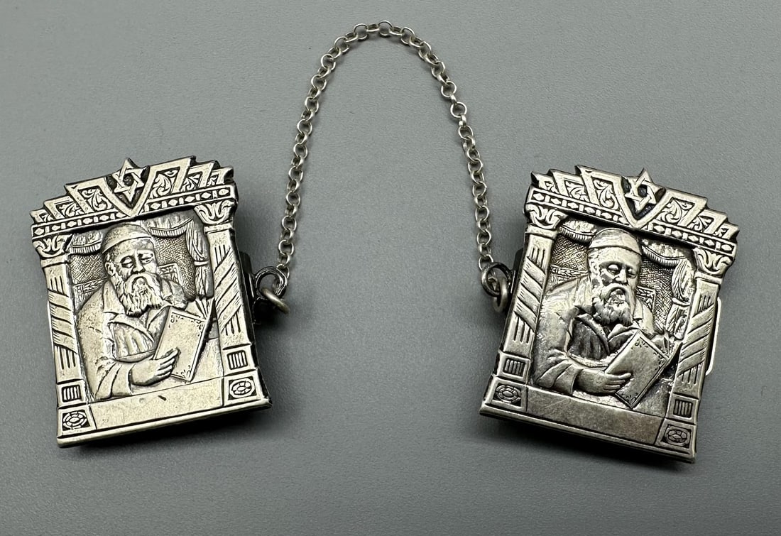 A pair of old silver tallit holders (1 of 4)