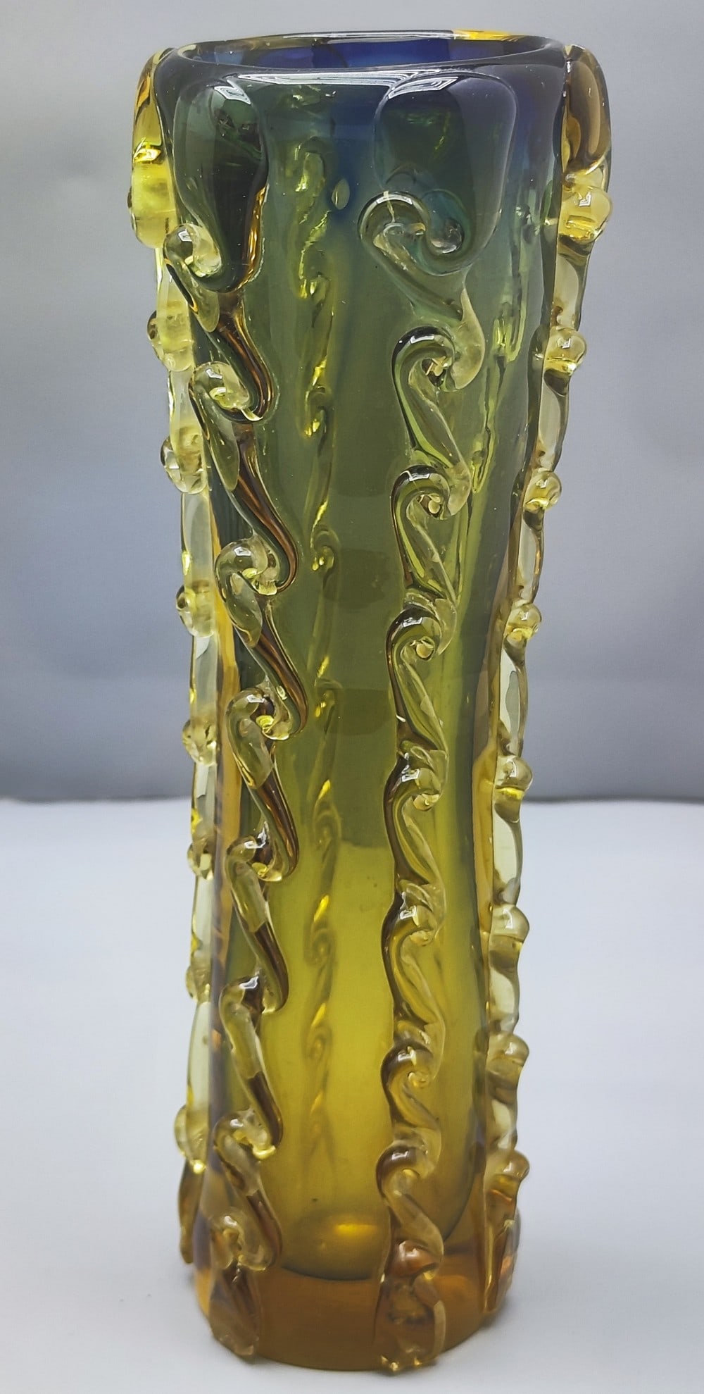 Vintage Murano Glass Vase: Vintage Murano glass vase, mid 20th century approximately, hand blown, with "glass coils" work along its length, blue-green-yellow glass colors, height: 24.5 cm, diameter: 7.5 cm, 1.25 kg. Minor chip 