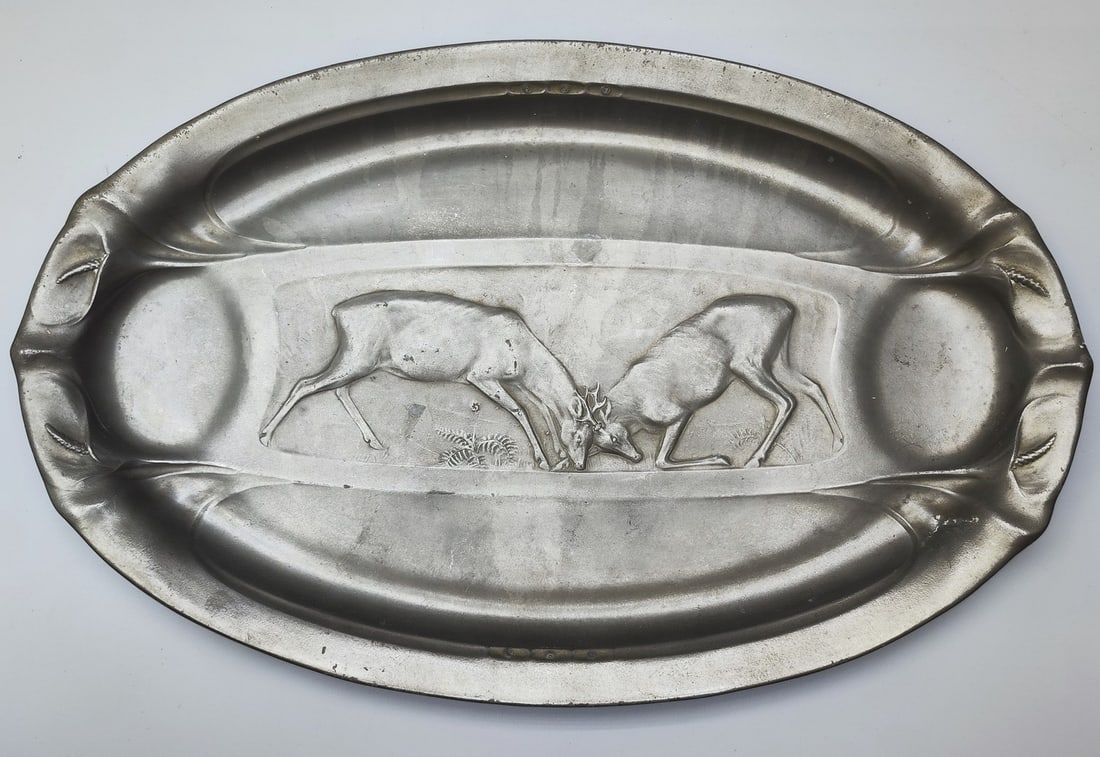 Pewter art nouveau tray made by Kayserzinn: Pewter art nouveau tray made in Kayserzinn, Germany, early 20th century approximately, the fight of the elk, saying decorated with the organ lines in the style of the period, signed and numbered model