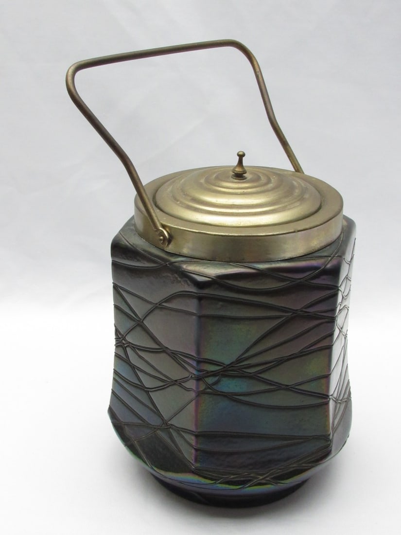 "Loetz" Jugendstil glass cookie container: "Loetz" Jugendstil glass cookie container, early 20th century, designed in a hexagonal model with a round base, made of glass in a metallic green-purple shade with an abstract pattern, top and alpaca