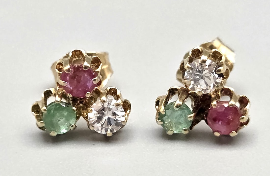 A pair of 14K gold earrings studded with gems (1 of 3)