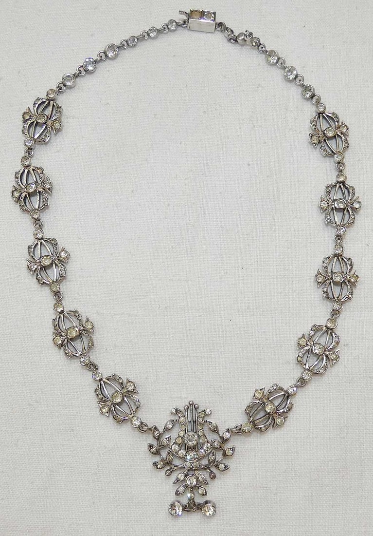 French Antique Neoclassicism / Belle Epoque Silver set with Rhinestones Necklace with Lyre, Swan: French Antique Neoclassicism / Belle Epoque Silver set with Rhinestones Necklace with Lyre Framed by a Laurel Wreath and Leaves, Swan Hallmark, Weight: 44 gr.Length to neck: 43 cm. (17 inches)Size of