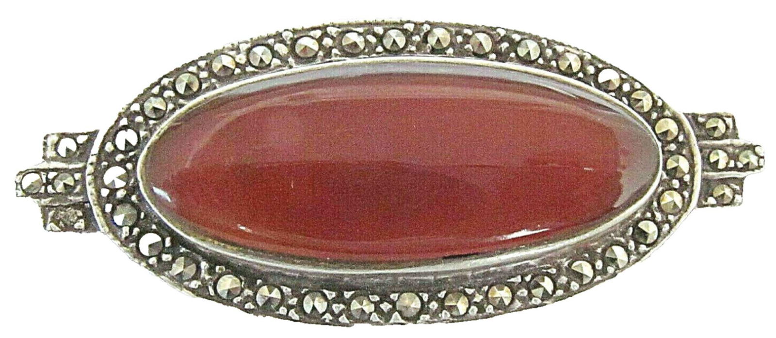 Persian Antique Amber Brooch in Silver Sterling 925 Frame set with Marcasite, Signed: Persian Antique Amber Brooch in Silver Sterling 925 Frame set with Marcasite, SignedMarked 925 and maker’s mark.Size: 4.7 x 2 cm. (1.8 x 0.78 inches)
