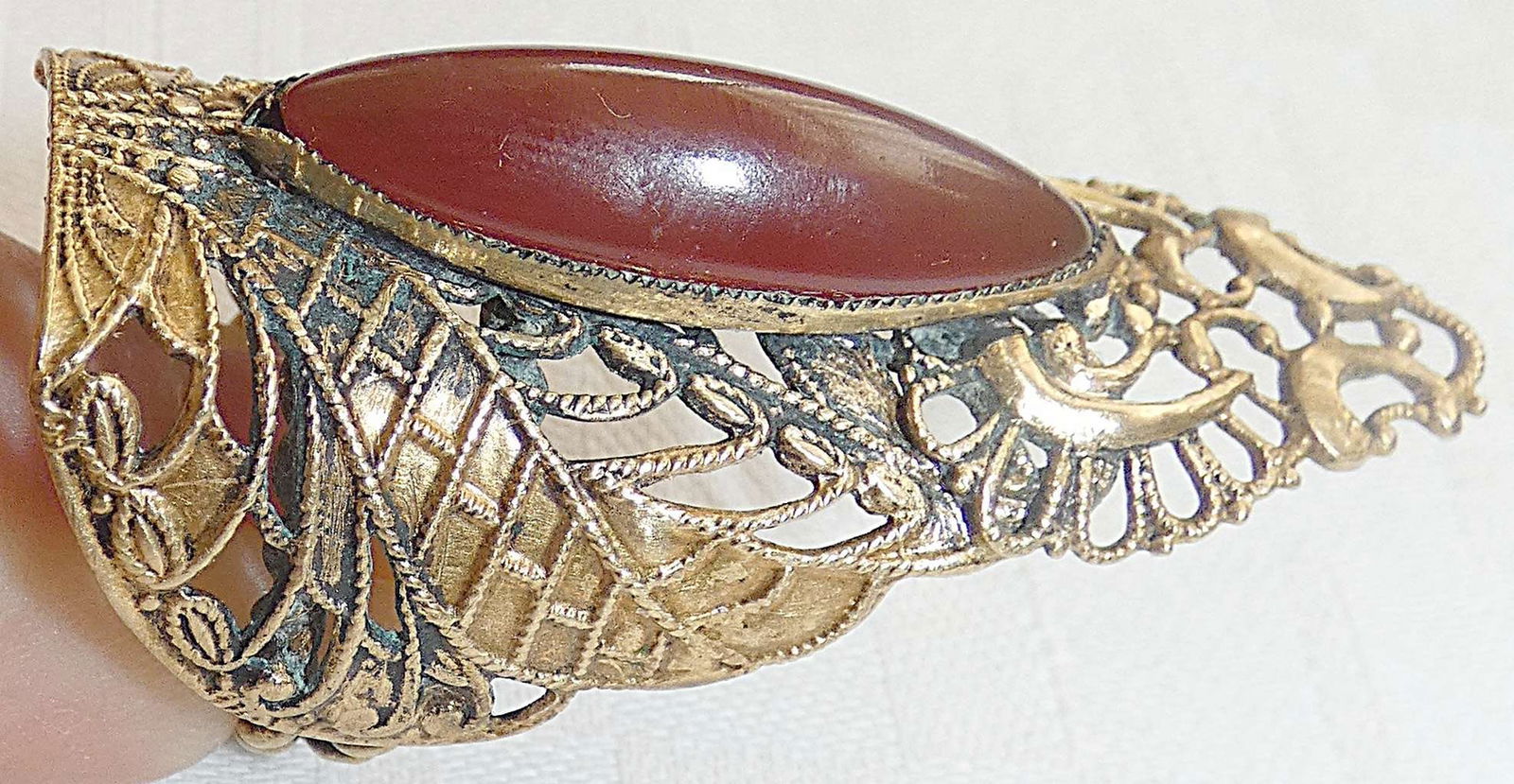 Victorian Antique Filigree Brass Ring set with Carnelian, Size: 6-6.25, Adjustable: Victorian Antique Filigree Brass Ring set with Carnelian, Size: 6-6.25, Adjustable Length to top: 4.8 cm. (1.8 inches) Length of carnelian: 2.8 cm. (1.1 inches) Weight: 9 gr. Hand crafted, hammered, p