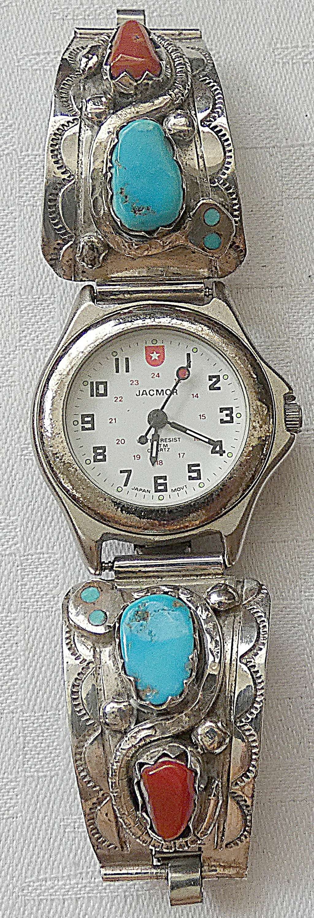 EFFIE C. ZUNI Sterling Silver Snake Watch Band set with Turquoise and Coral, Signed: EFFIE C. ZUNI Sterling Silver Snake Watch Band set with Turquoise and Coral, Signed Size of link: 3.1 x 2.2 cm. (1.2 x 0.8 inches) Other part of band – starch Quartz Watch - battery is to replace We