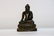 A chinese bronze buddha statue