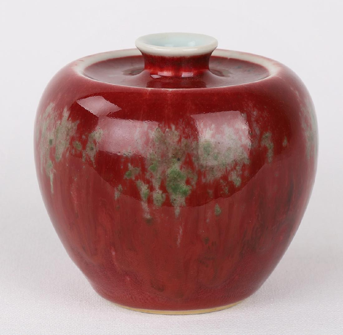A CHINESE RED GLAZED IMPRESSED VASE WITH KANGXI MARK (1 of 10)