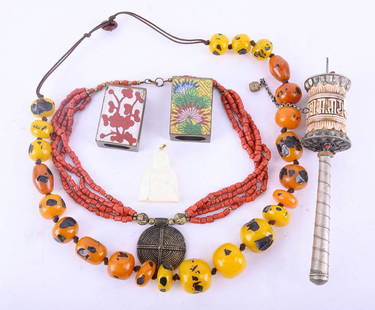 Lot Of Old Buddhist Items: Title: Buddhist Items Medium: Varies, Copper, Amber, Coral. Style: Buddhist Size: Prayer Wheel: 9" H x 2" D Amber Necklace:34" Length Age: Antique Condition: Good overall condition for its age, 