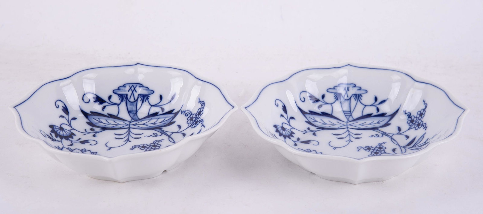 Set Of 2 Meissen Porcelain Blue And White Plates: Title: Set Of 2 Meissen Porcelain Plates Medium: Porcelain Plate Brand: Meissen Size: 6" D Condition: Good overall condition for its age, Meissen mark at bottom Great for collection or home decoration