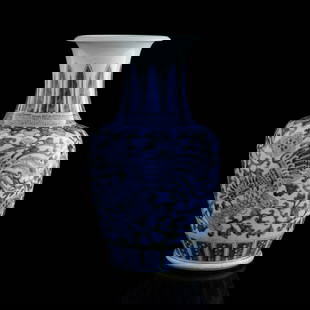 A Chinese blue and white 'phoenix' vase, early 19th century: Size H: 16 1/4, Dia: 9 1/2 in. (H: 41.28, Dia: 24.13 cm.) Description A Chinese blue and white 'phoenix' vase early 19th century Condition With old chipping to foot, overall good condition. Shipping: