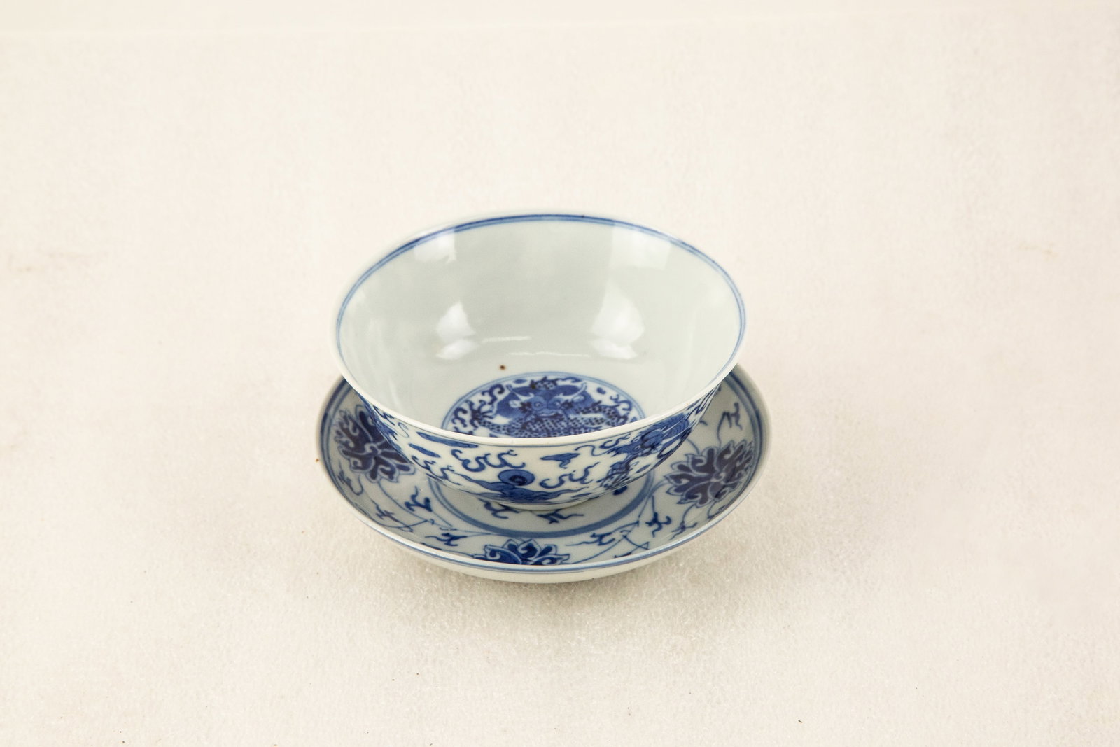 Blue and White Dragon Gaiwan Set: Title: Blue and White Dragon Gaiwan Set Medium: Chinese Porcelain Size: 2." H x 5." W x 5." L Condition: Good vintage condition with wear consistent with age and use. Minor surface wear and age-relate