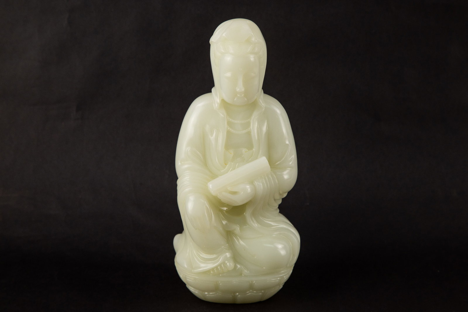 Carved Hardstone Guanyin Figure: Title: Carved Hardstone Guanyin Figure Medium: Carved Hardstone Size: 10.5" H x 4." W x 5." L Condition: Good vintage condition with wear consistent with age and use. Minor surface wear and age-relate