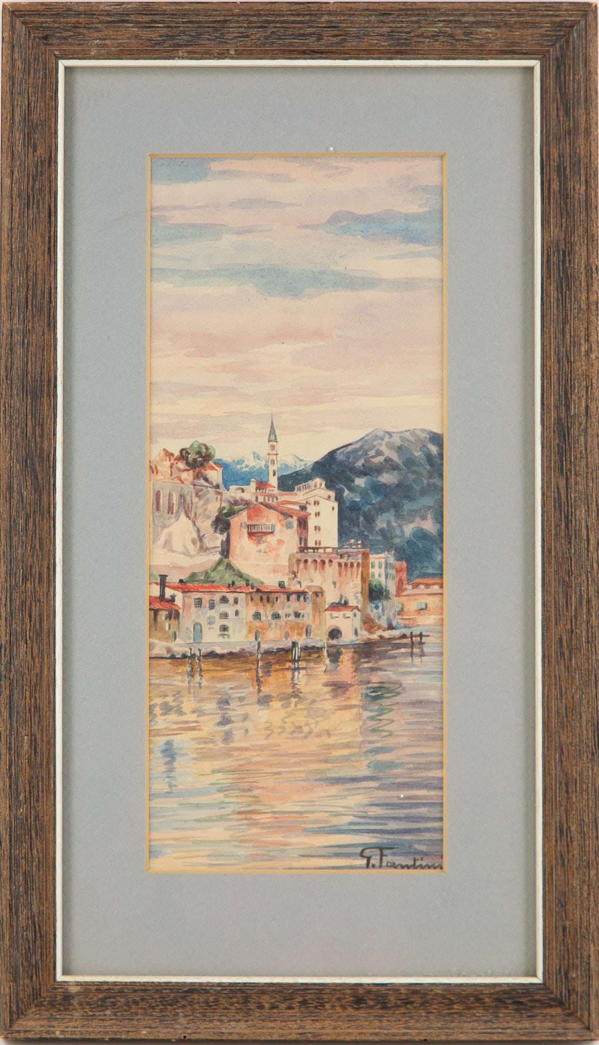 This artwork is a watercolor landscqpe painting depicting a tranquil lakeside town.: Painting Size:11.5 x 5 Frame Size: 16.5 x 9.5 Framing Options: We offer in house framing if you would like your artwork to be framed. Please contact us after the sale for a quote. We have experienced 