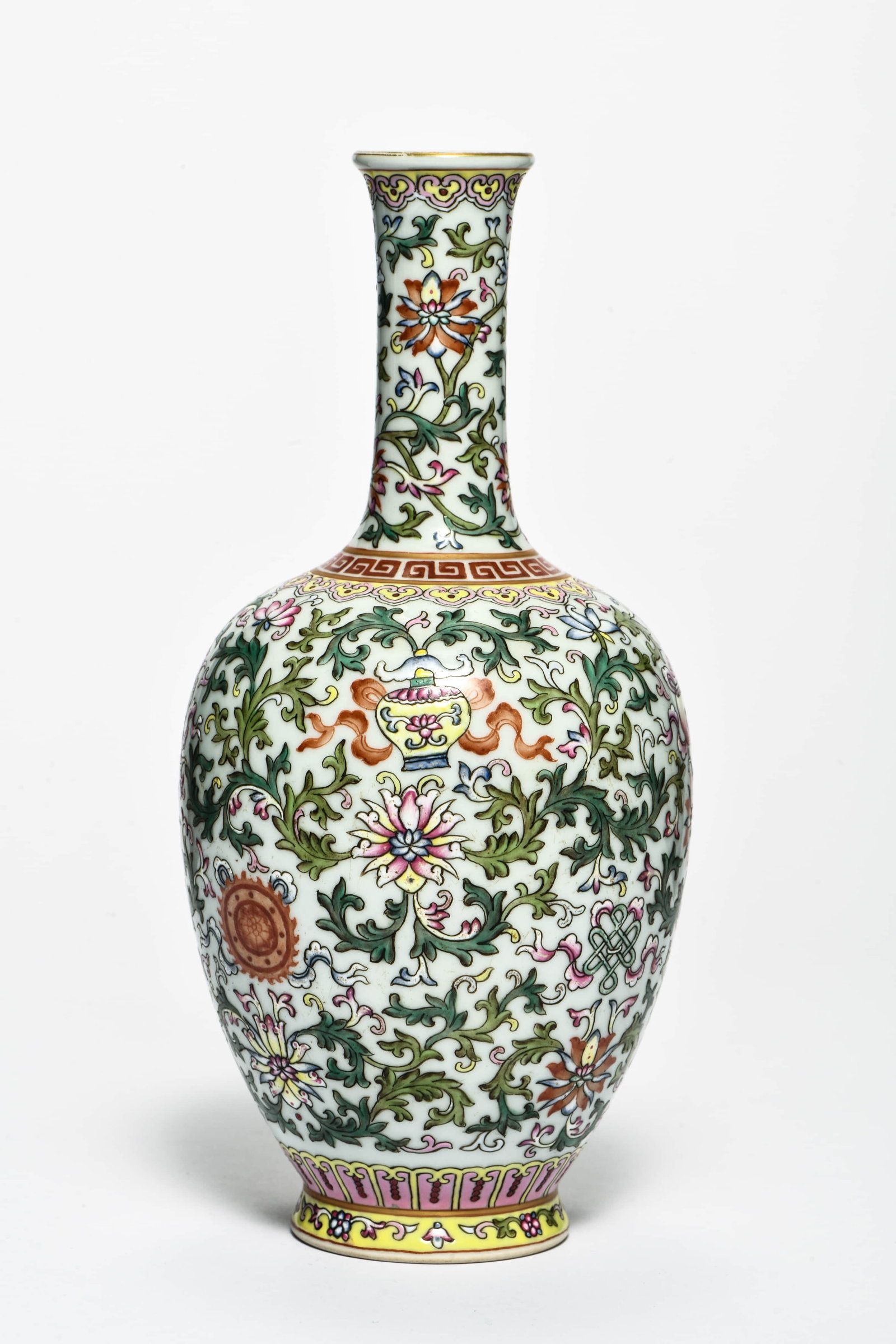 A famille rose 'Interlocking flowers' vase: A FAMILLE ROSE 'INTERLOCKING FLOWERS' VASE Description: Length::10cm Width::10cm Height::21cm Bidders need to know All the items are sold as is and all sales are final. All bidders are encouraged to r