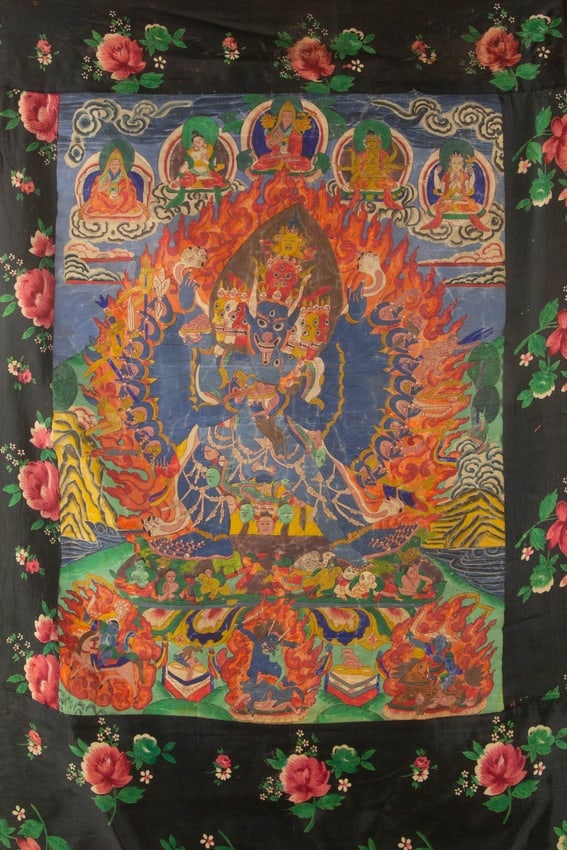 "Vajrabhairava Yamantaka within a Flaming Aureole" Tibeto-Chinese Thangka Distemper on Cloth: Medium: Distemper on Cloth Style: Tibeto-Chinese Thangka Painting Size: 26 x 19 inches Frame Size: 38 x 27 inches Condition: This artwork is in fair condition for its age, the thangka shows widespread