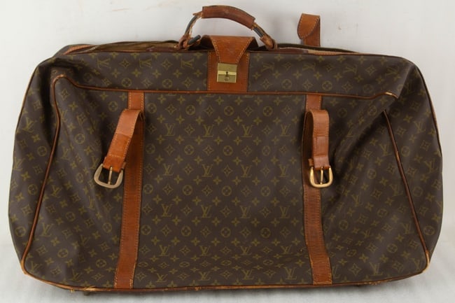 Louis Vuitton Vintage Monogram Vanity Case (Train Case): Size: H 17 x L 29 x W 7.5 inches Condition: Good overall condition for its age. Fair Vintage Condition. The Vachetta leather handle and trim show a heavy, dark, honey patina and creasing. The canvas i