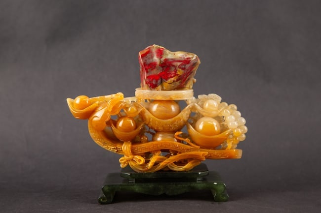 Carved Hardstone Prosperity-Themed Decorative Sculpture: Title: Carved Hardstone Prosperity-Themed Decorative Sculpture Medium: Carved Hardstone Size: 5.5" H x 2.5" W x 6.5" L Condition: Good vintage condition with wear consistent with age and use. Minor su