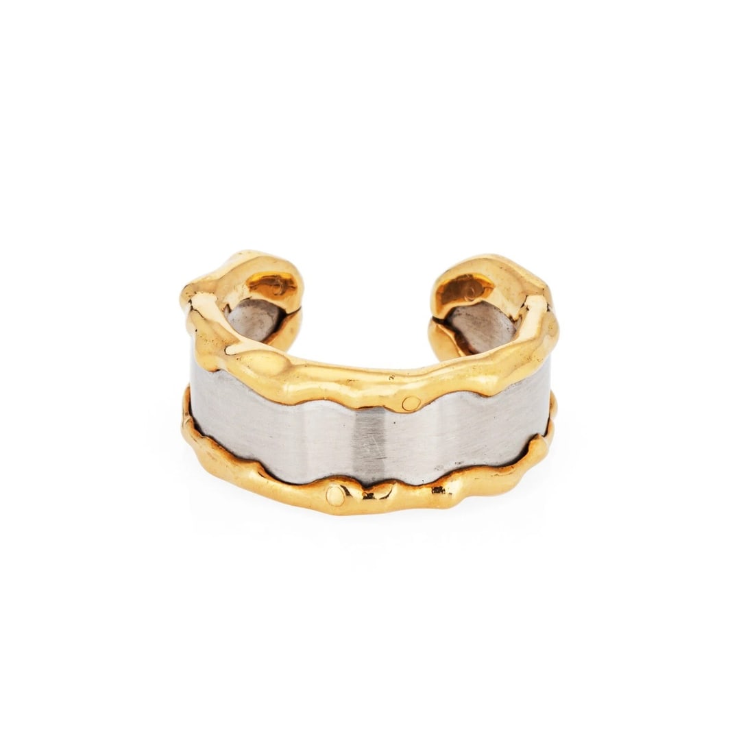 Vintage Two-Tone Sculptural Cuff Bracelet: VINTAGE TWO-TONE SCULPTURAL CUFF BRACELET Provenance and Authenticity: This object is presented as a vintage open cuff bracelet combining a broad silver-tone central band with irregular gold-tone bord