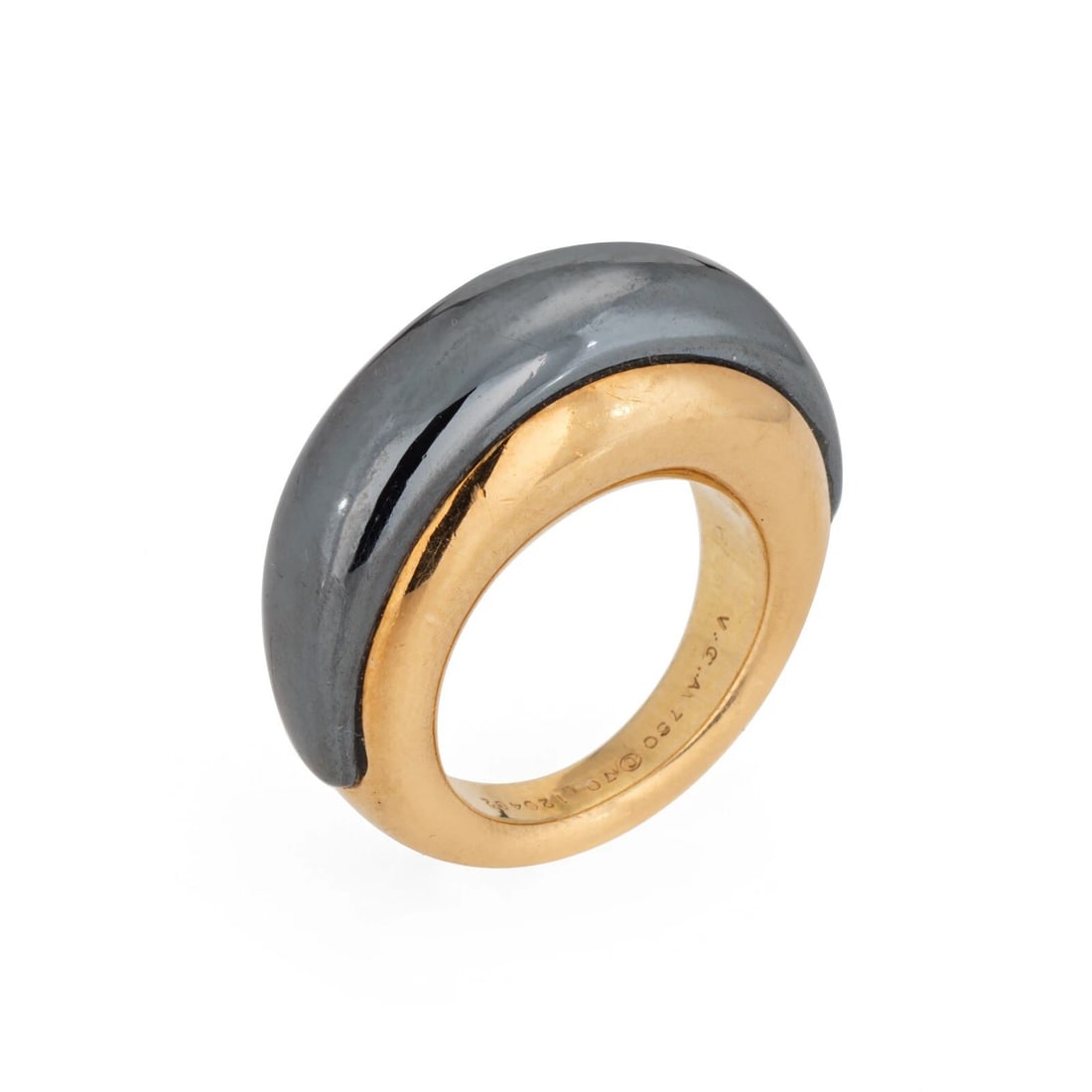 Van Cleef & Arpels-Style 18K Gold and Hematite Dome Ring: VAN CLEEF & ARPELS-STYLE 18K GOLD AND HEMATITE DOME RING Provenance and Authenticity: This object is presented as a vintage sculptural ring composed of a broad yellow-gold band surmounted by a smoothl