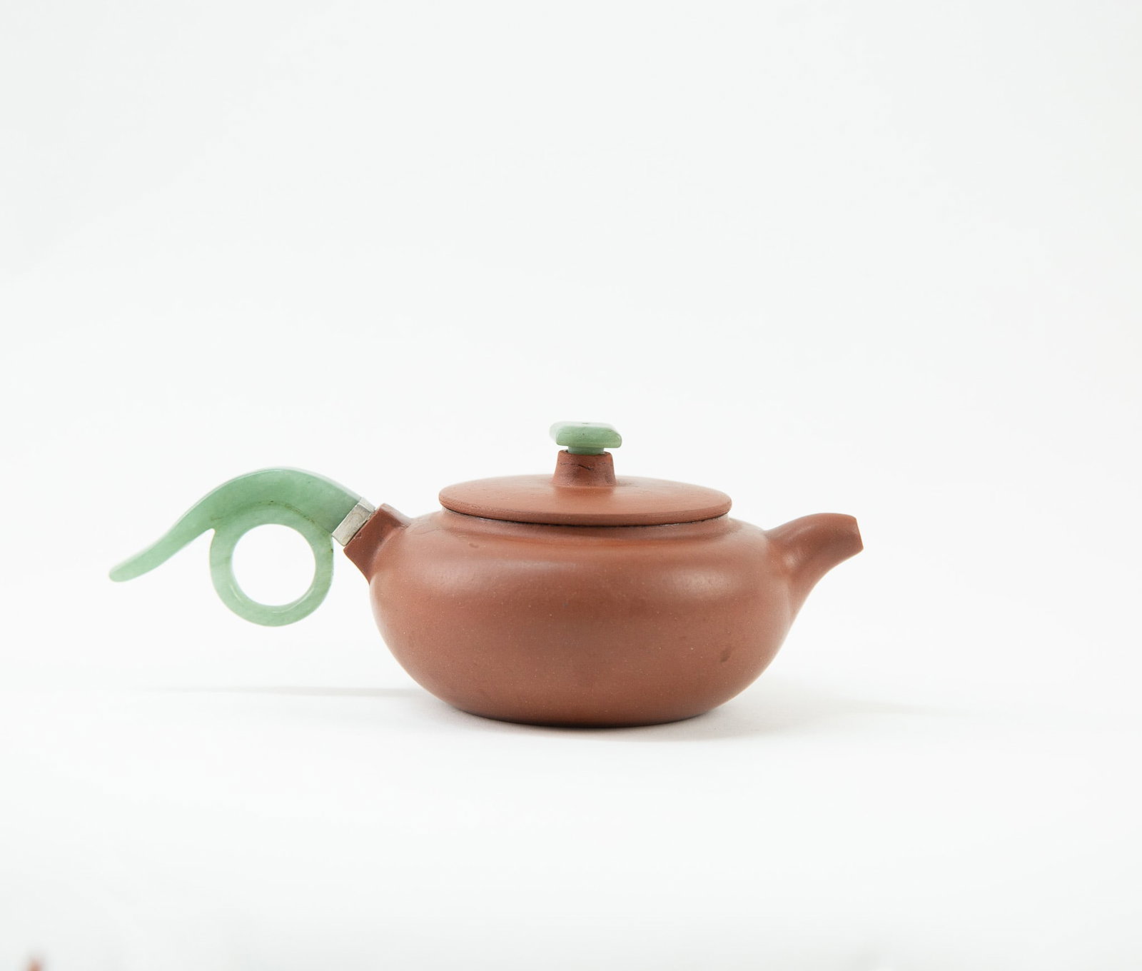 Zisha Teapot with Jade Handle: Item Size: 7.5 x 2.5 x 4.5 inches Condition: This item is in great condition for its age.