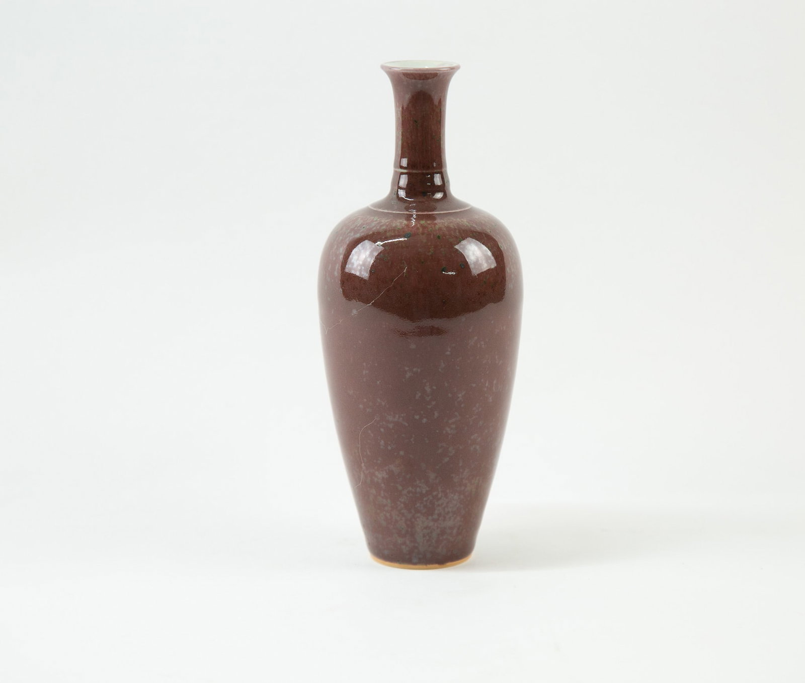 Purple-Glazed “Beauty’s Shoulder?? Vase: Item Size: 3.5 x 7.5 inches Condition: This item is in great condition for its age. Of tall liuye form, with a flared rim, slender neck, gently sloping shoulders, and elongated rounded body. The elega