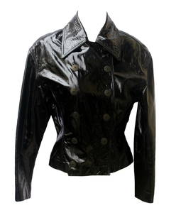 Martine Sitbon PATENT LEATHER SPENCER: Martine Sitbon PATENT LEATHER SPENCERDESCRIPTION:Patent leather for this spencer double breasted with decorated metal buttons. Lined in fine off colour cotton gauze Made in Italy in the 80s. Size IT