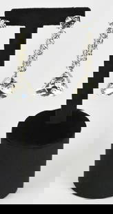 Christopher Kane EARRINGS: Christopher KaneEARRINGSDESCRIPTION:Dangling metal earrings with rhinestones, complete with original box. Perfectly preserved.DESCRIZIONE:Orecchini pendenti in metallo con strass, completi di scatola