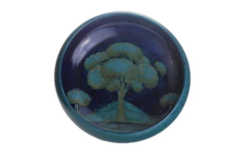 William Moorcroft for Moorcroft Pottery ‘MOONLIT BLUE’ LARGE BOWL, CIRCA 1925: A Superb William Moorcroft Pottery Moonlit Blue Tree Landscape Pattern Shallow Bowl. The delightful bowl has mid-blue tube-lined trees with brown highlights over a graduated cobalt blue ground. It is