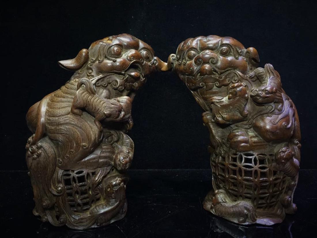 A Pair of Bamboo Foo Dogs: A Pair of Bamboo Foo Dogs 20 x 12 x 21 cm.