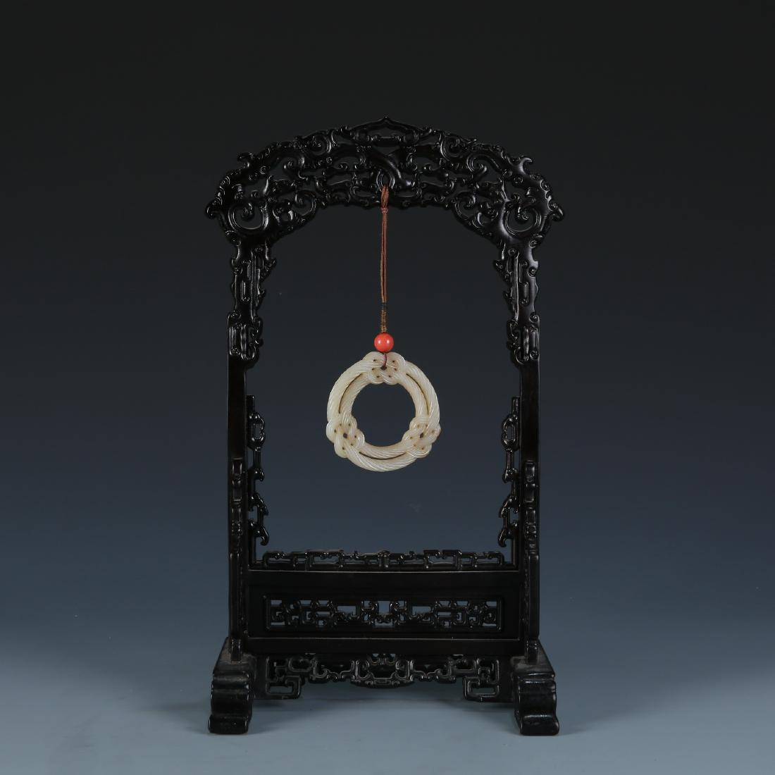 Carved White Jade Infinity Knot in Wood Hanger (1 of 5)