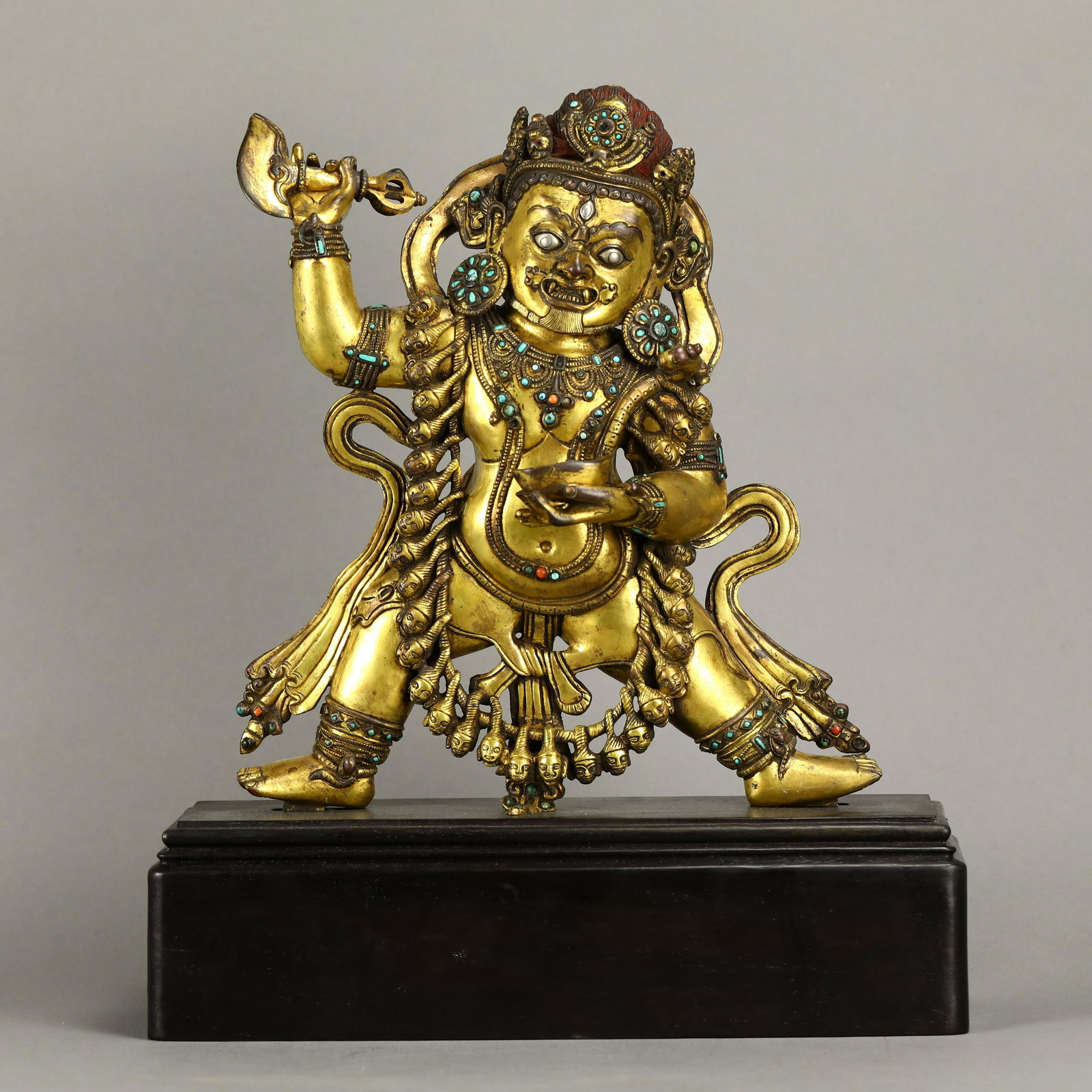 TURQUOISE-INLAID GILT BRONZE FIGURE OF MAHAKALA (1 of 9)