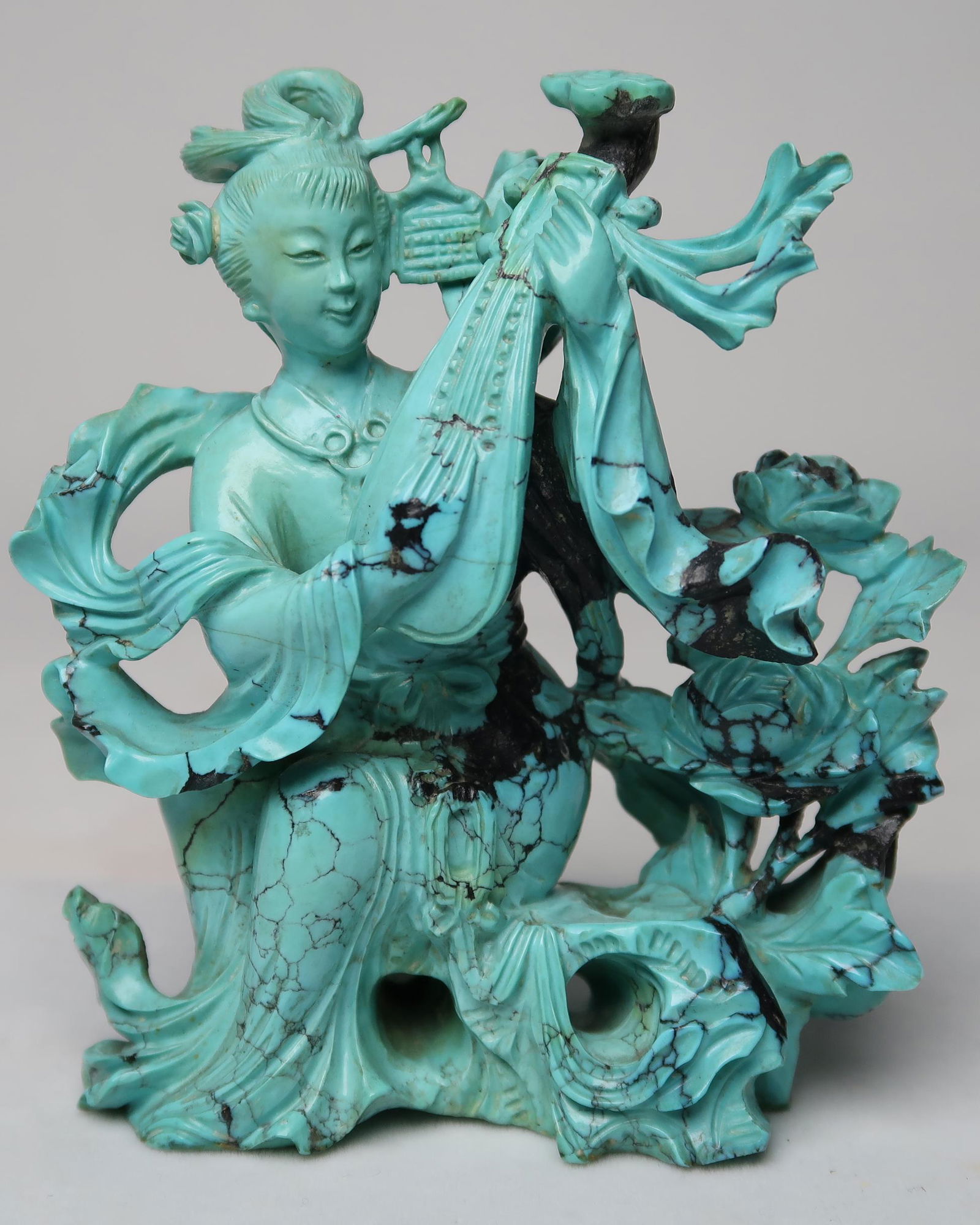 CARVED TURQUOISE FIGURE OF A LADY PLAYING INSTRUMENT (1 of 10)