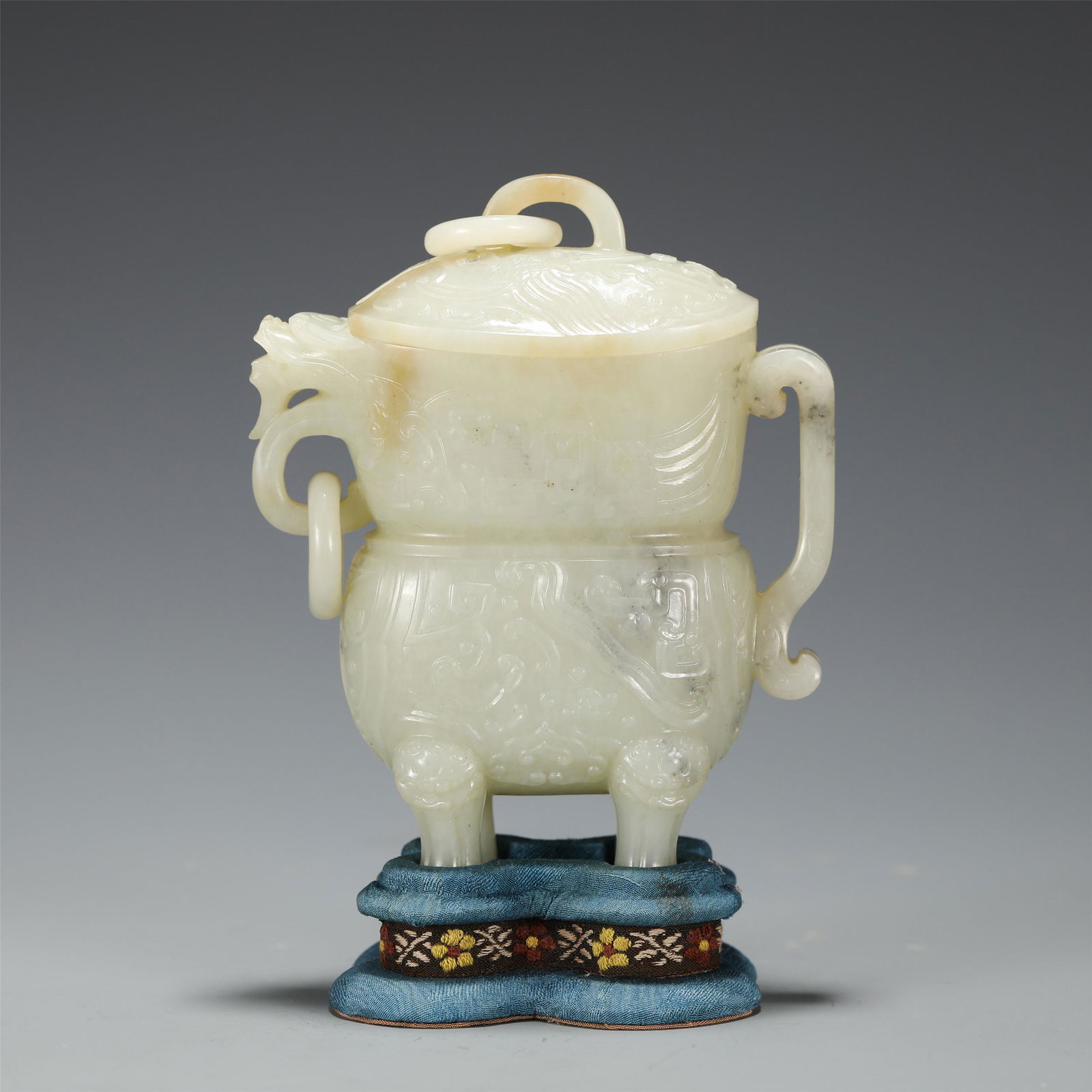 AN ARCHAIC CARVED WHITE JADE VESSEL (1 of 10)