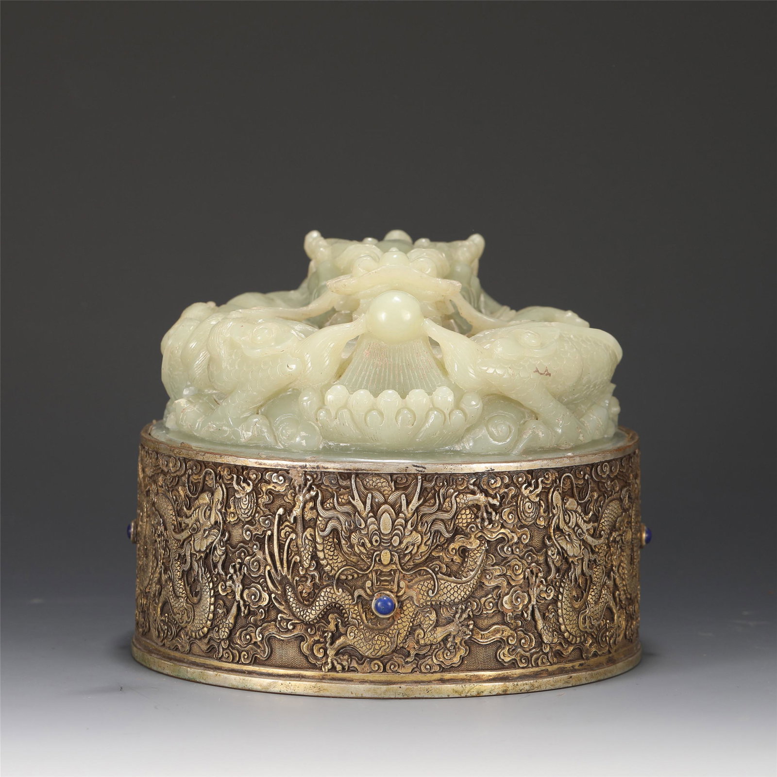A CARVED WHITE JADE DRAGON SEAL (1 of 10)