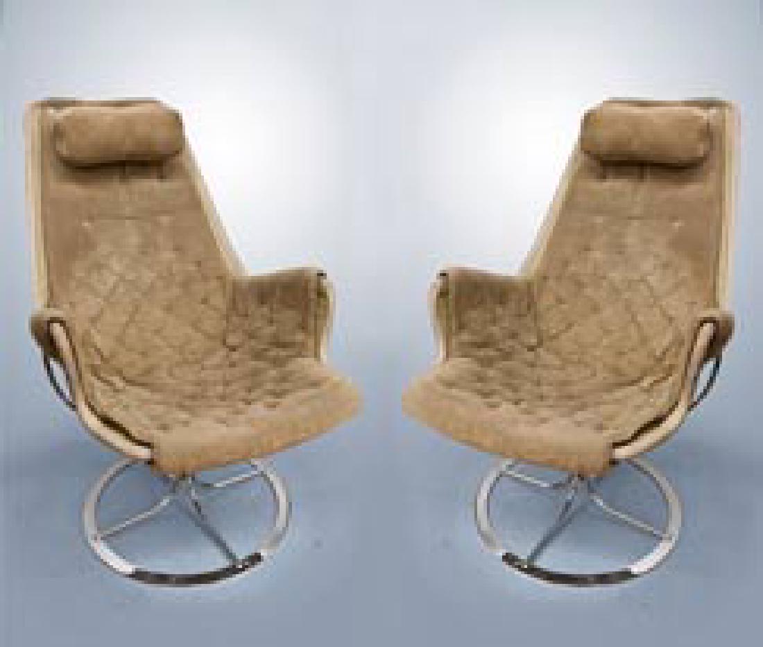 A Pair of "Jetson" Armchairs, Bruno Mathsson for Dux,: A Pair of "Jetson" Armchairs, Bruno Mathsson for Dux, Sweden, 1965 Height: 96 cm; width: 90 cm Condition: Upholstery warn out. Needs cleaning. Notes: Bruno Mathsson (1907 –1988) was a Swedish furnit