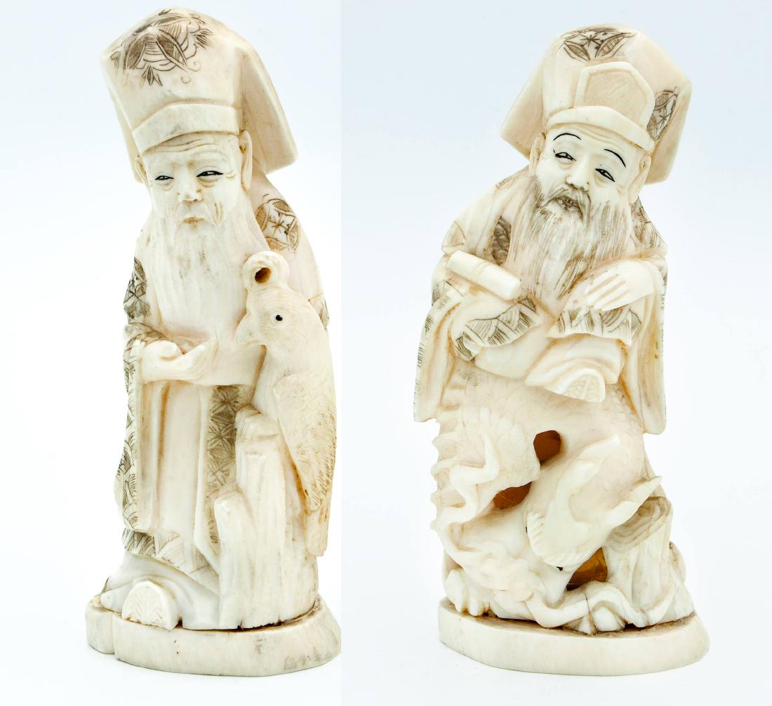 Two Carved Okimono of Sorcerers, Japan, Early 20th: Two Carved Okimono of Sorcerers, Japan, Early 20th Century Description: Marked (on the underside). Height: 19.5 cm (each)