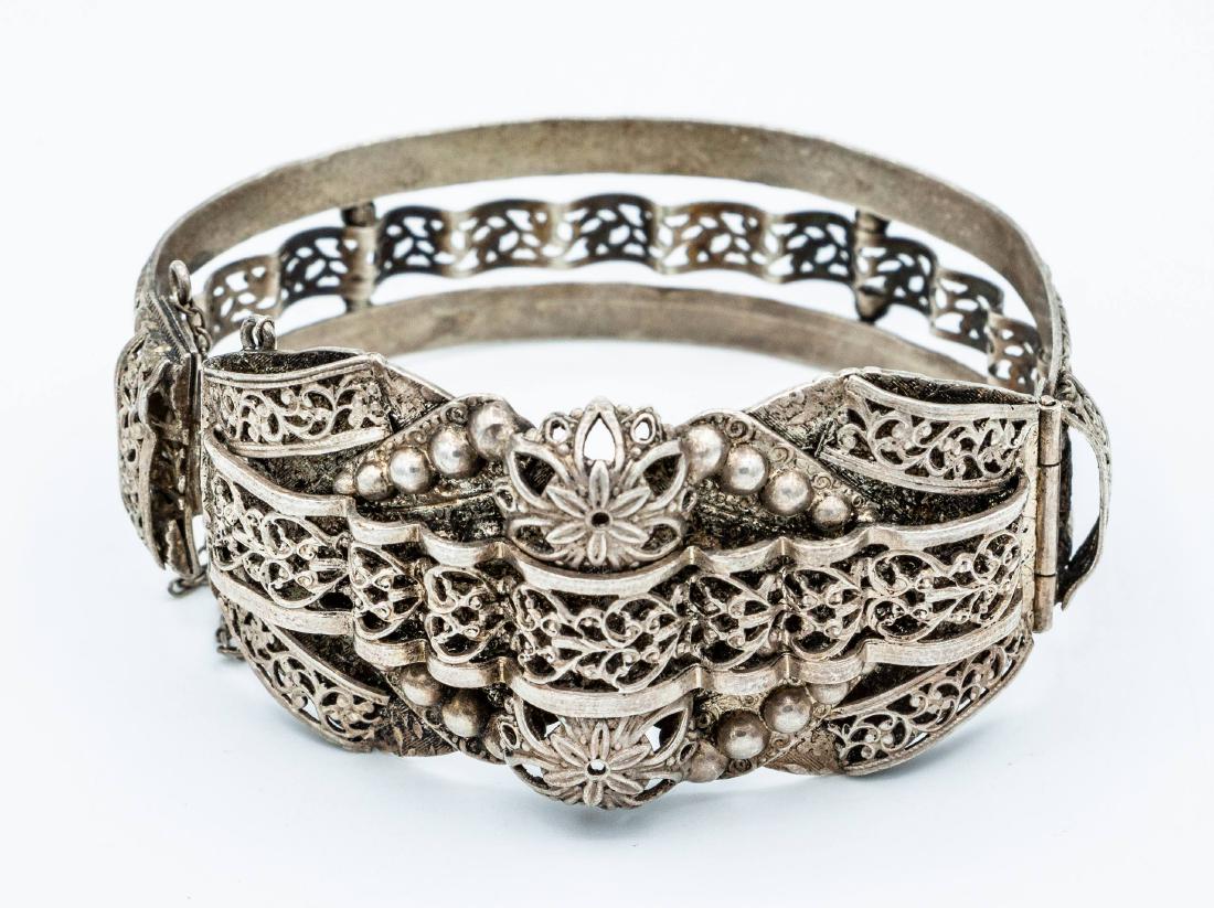 A Silver Bracelet, Yemen, Mid 20th Century: A Silver Bracelet, Yemen, Mid 20th Century Description: Decorated throughout with filigree.