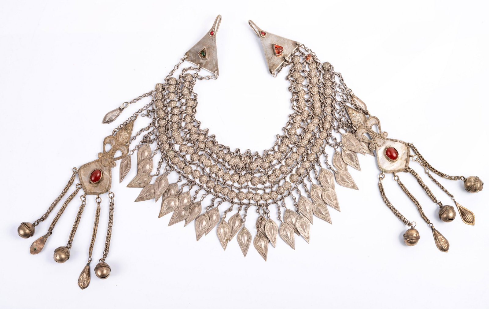 A Fine Headdress Ornament, Uzbekistan, 19th Century: A Fine Headdress Ornament, Uzbekistan, 19th Century Composed of three rows weave of flower shaped plates with suspended leaflet tassels and flanked by temple pendants. Length: 67 gr; total weight: 301